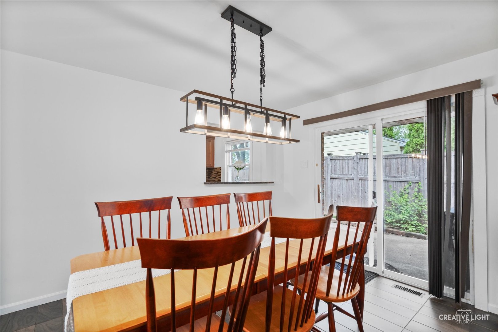 125 South Pinecrest Road Bolingbrook, IL 60440 - Photo 12 of 22 a view of a dining room with furniture window and outside view