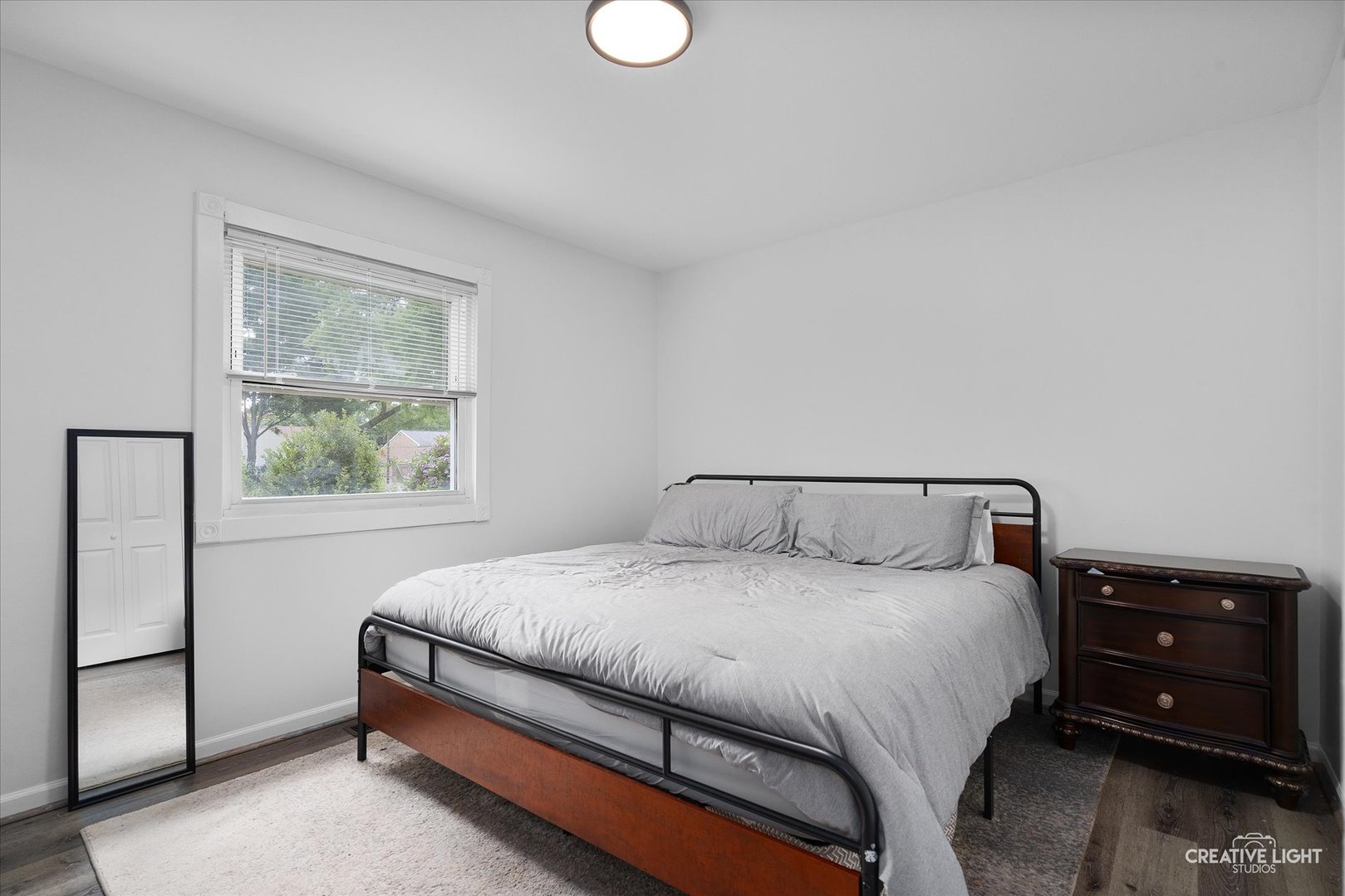 125 South Pinecrest Road Bolingbrook, IL 60440 - Photo 15 of 22 a bedroom with a bed and a window