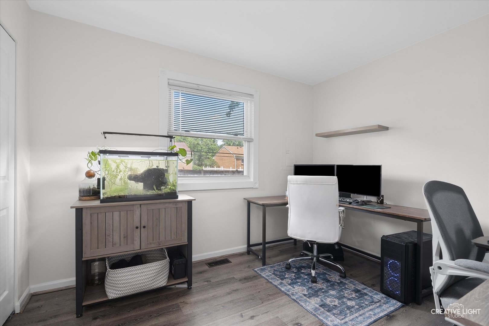 125 South Pinecrest Road Bolingbrook, IL 60440 - Photo 18 of 22 a workspace with furniture and wooden floor