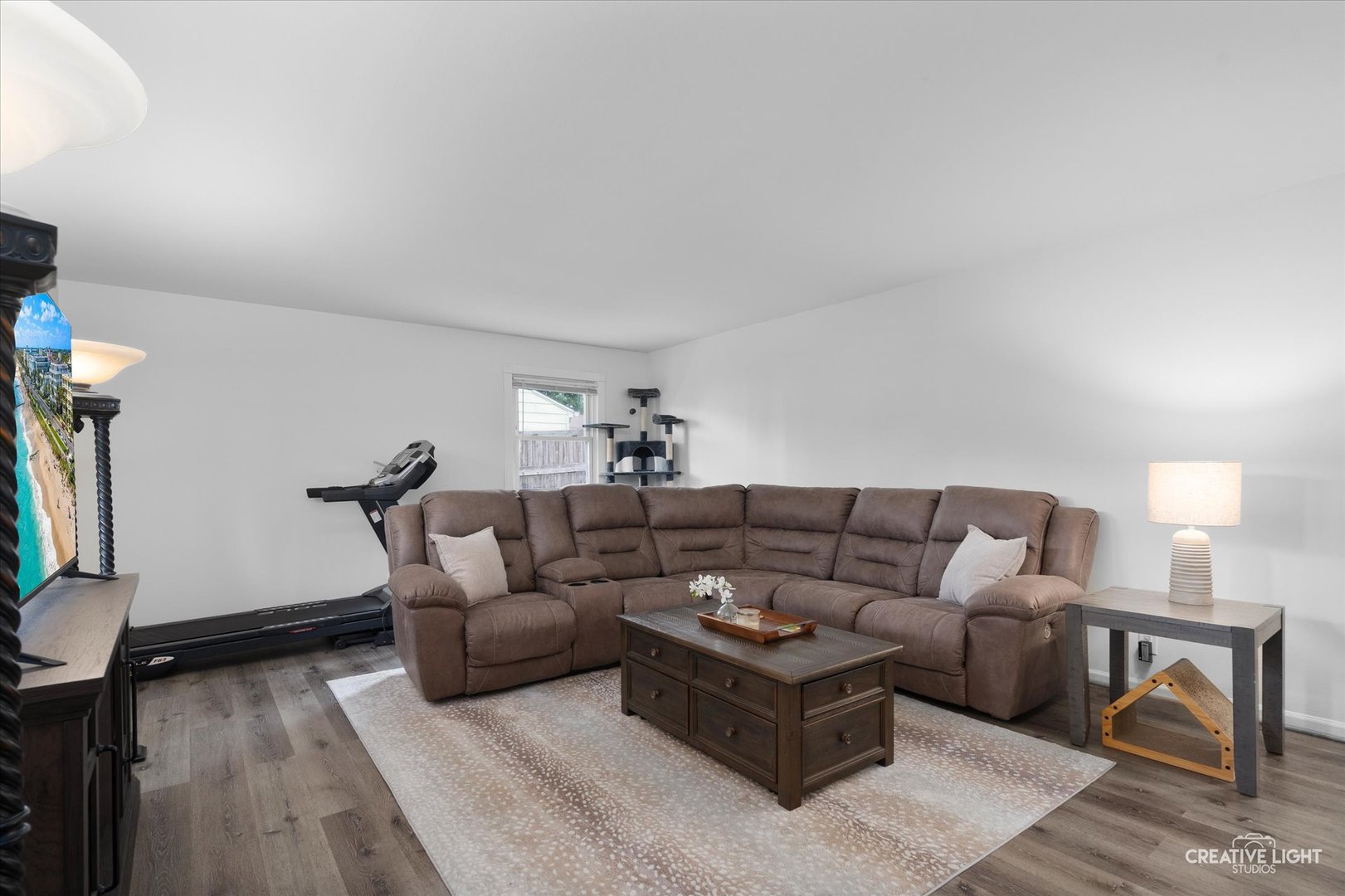 125 South Pinecrest Road Bolingbrook, IL 60440 - Photo 3 of 22 a living room with furniture and a wooden floor