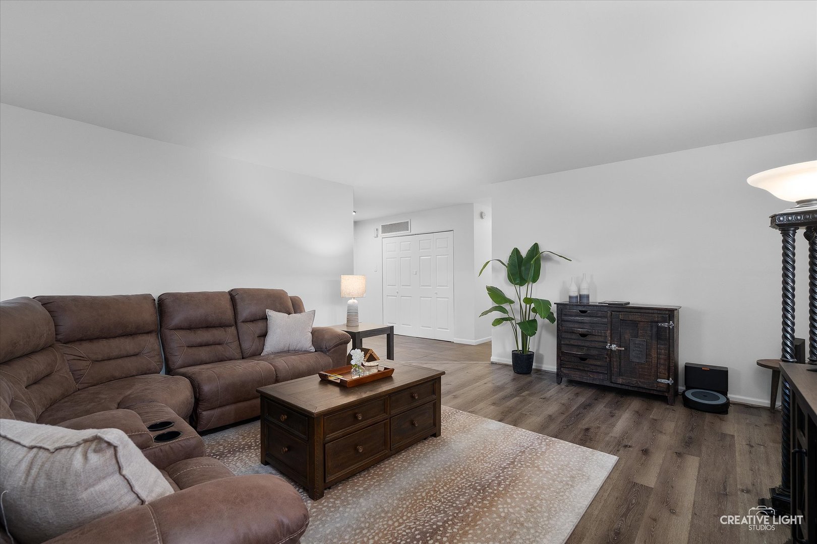 125 South Pinecrest Road Bolingbrook, IL 60440 - Photo 4 of 22 a living room with furniture and wooden floor