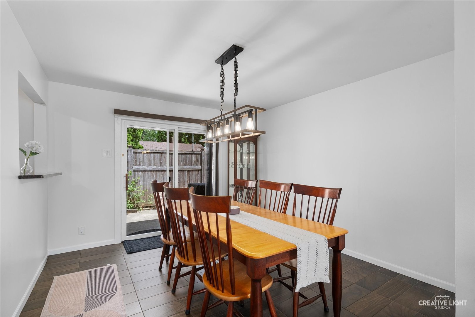 125 South Pinecrest Road Bolingbrook, IL 60440 - Photo 10 of 22 a view of a dining room with furniture window and wooden floor