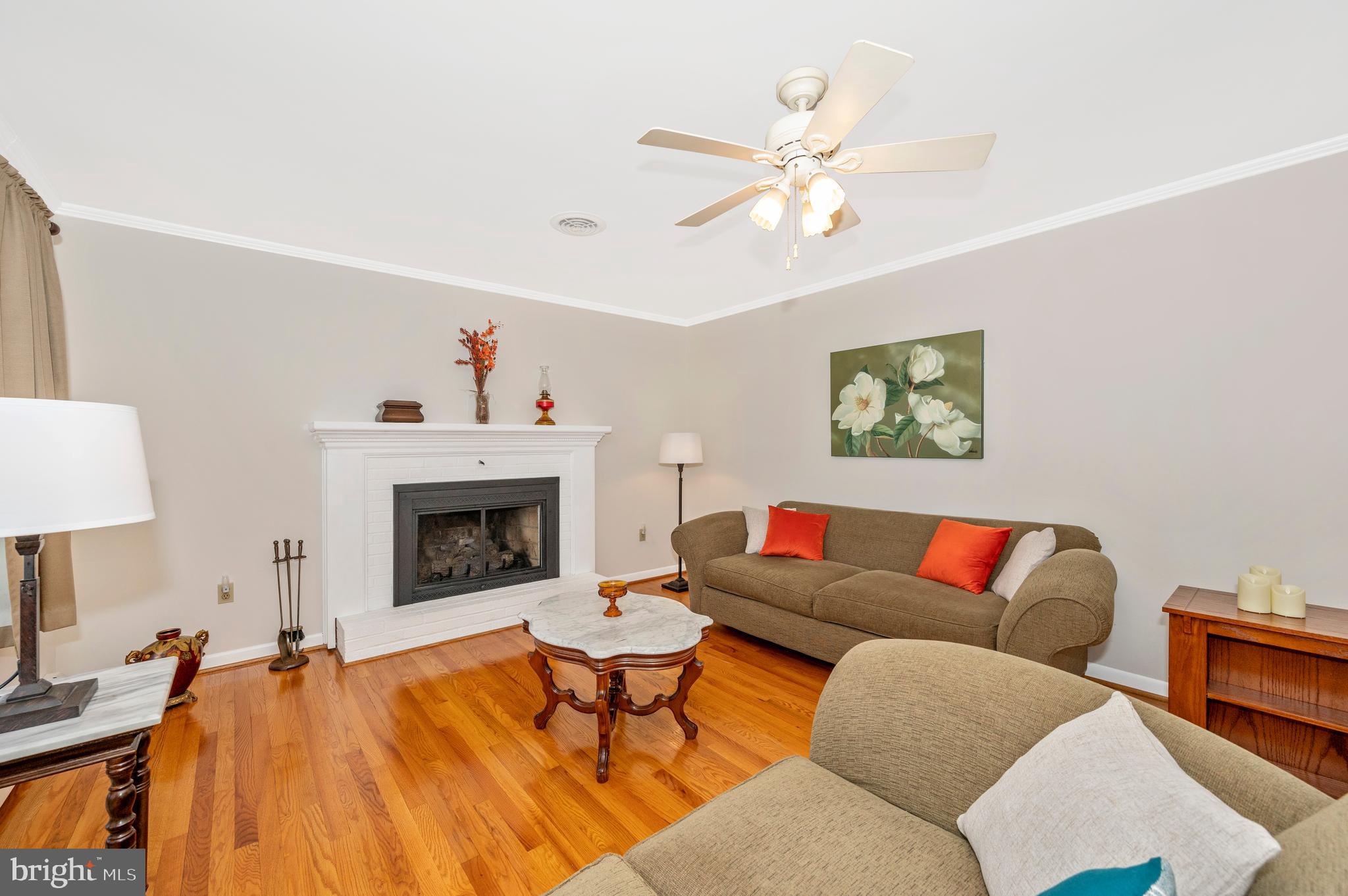 12819 Spickler Road Clear Spring, MD 21722 - Photo 30 of 44 a living room with furniture and a fireplace