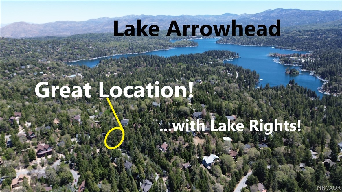132 Grizzly Road Lake Arrowhead, CA 92352 - Photo 1 of 19 a view of outdoor space with signage and flags