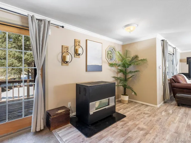 a kitchen with stainless steel appliances granite countertop a refrigerator a sink a stove a microwave and island