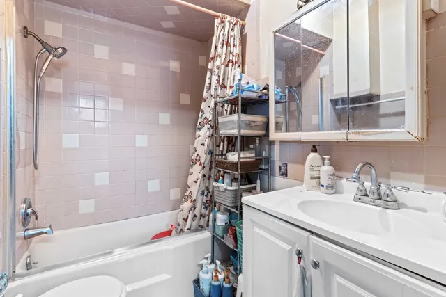 a bathroom with a sink and a bathtub
