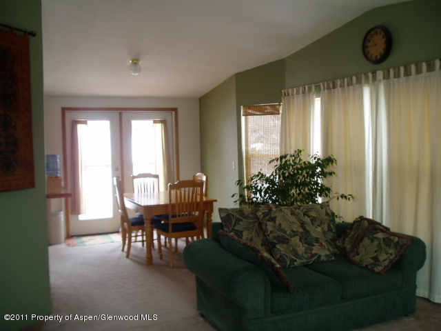 659 Park Avenue Rifle, CO 81650 - Photo 4 of 15 a living room with furniture and a large window