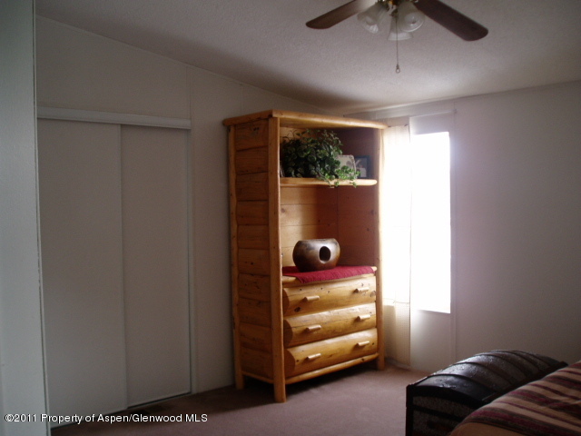 659 Park Avenue Rifle, CO 81650 - Photo 7 of 15 a room with furniture and a window