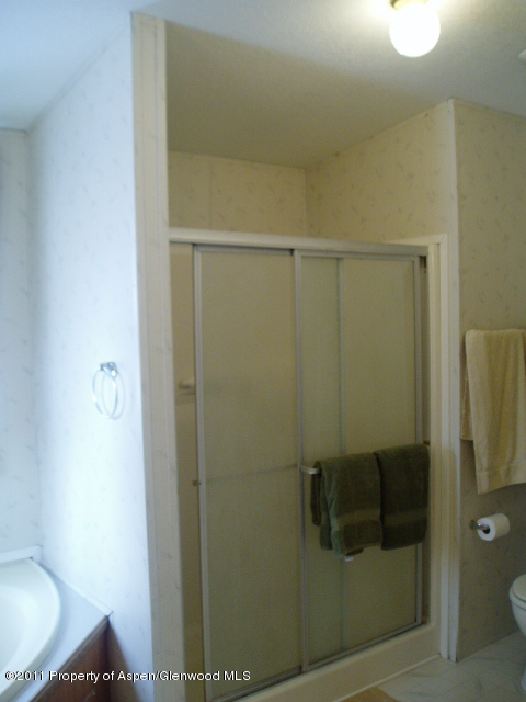659 Park Avenue Rifle, CO 81650 - Photo 10 of 15 a bathroom with a shower