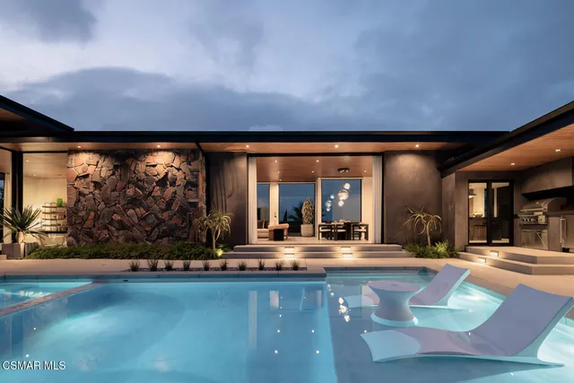 a view of a living room and dining room