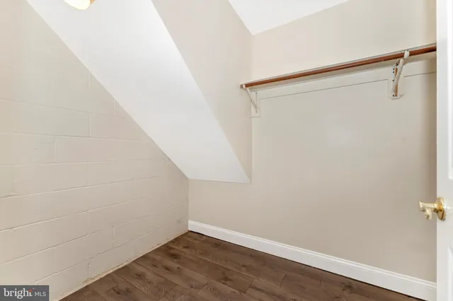 a view of small space with wooden floor