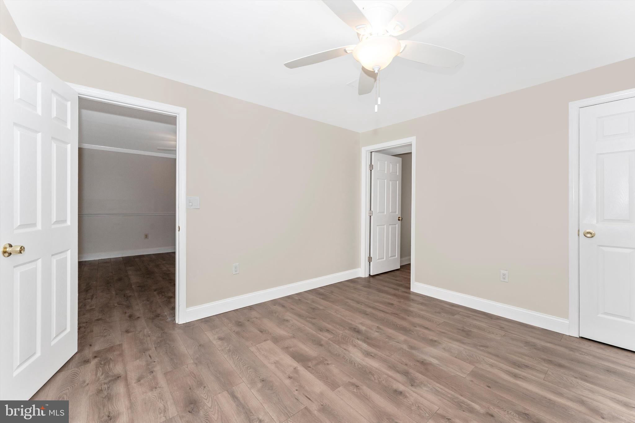 4216 Sykesville Road, Unit B Finksburg, MD 21048 - Photo 16 of 27 a view of an empty room with wooden floor