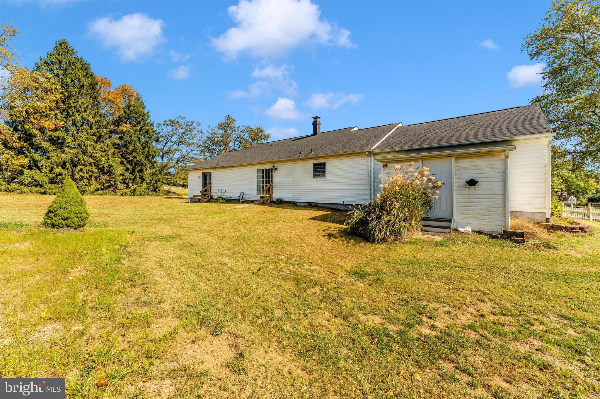 4216 Sykesville Road, Unit B Finksburg, MD 21048 - Photo 26 of 27 a yellow house with swimming pool in front of it