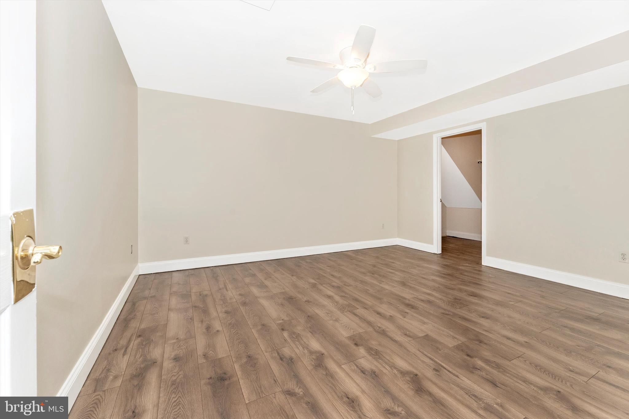 4216 Sykesville Road, Unit B Finksburg, MD 21048 - Photo 7 of 27 a view of an empty room with wooden floor