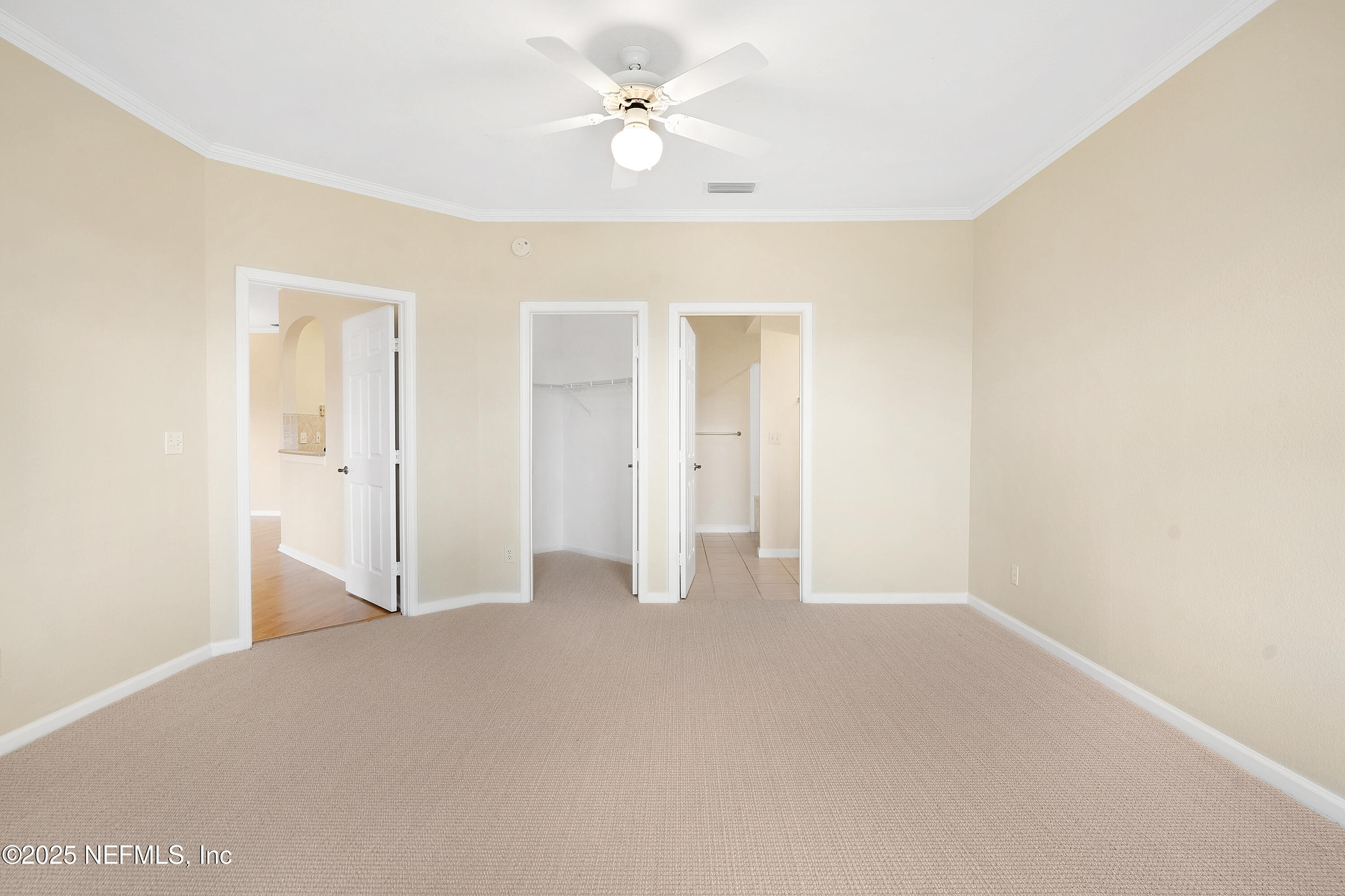 2827 Vista Cove Road St. Augustine, FL 32084 - Photo 17 of 59 an empty room with a ceiling fan and a window