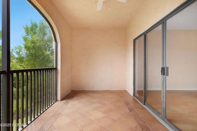 a bathroom with a bathtub and window