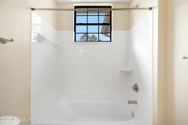 a view of a balcony with an outdoor space