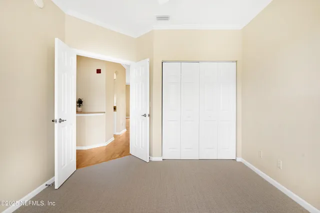 a view of lake with green space