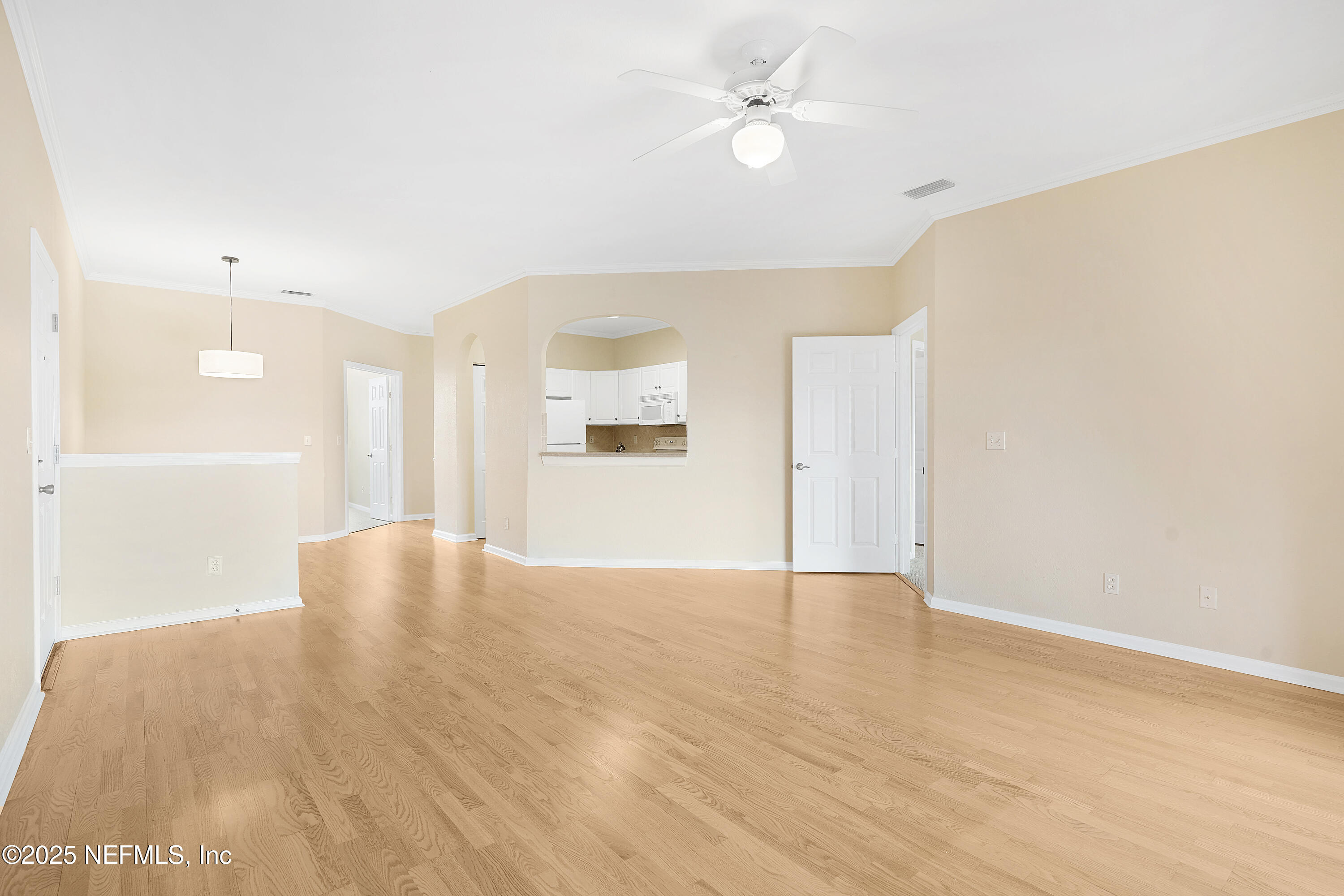 2827 Vista Cove Road St. Augustine, FL 32084 - Photo 34 of 59 a view of an empty room with a kitchen