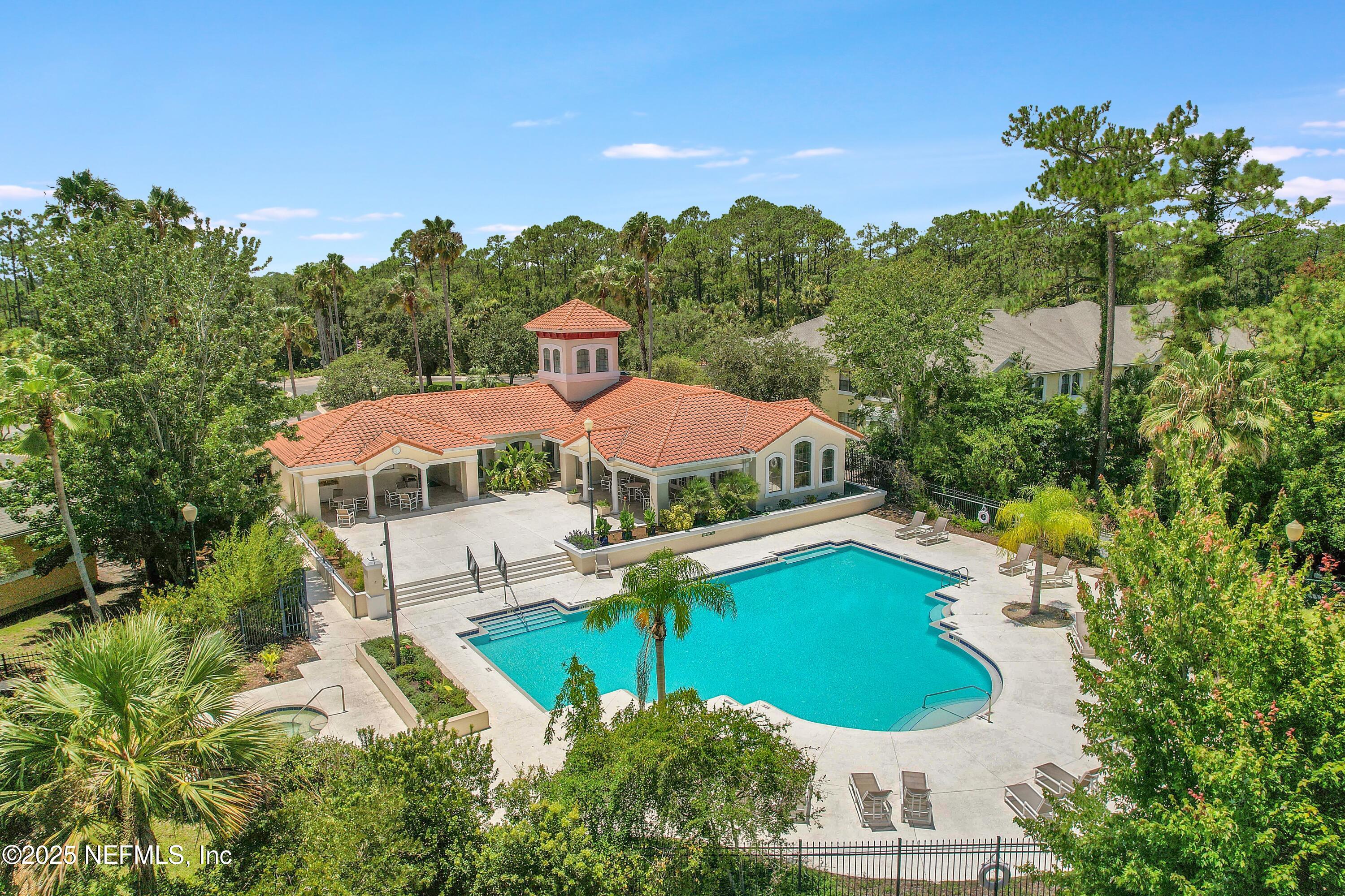 2827 Vista Cove Road St. Augustine, FL 32084 - Photo 42 of 59 a view of a swimming pool with a yard