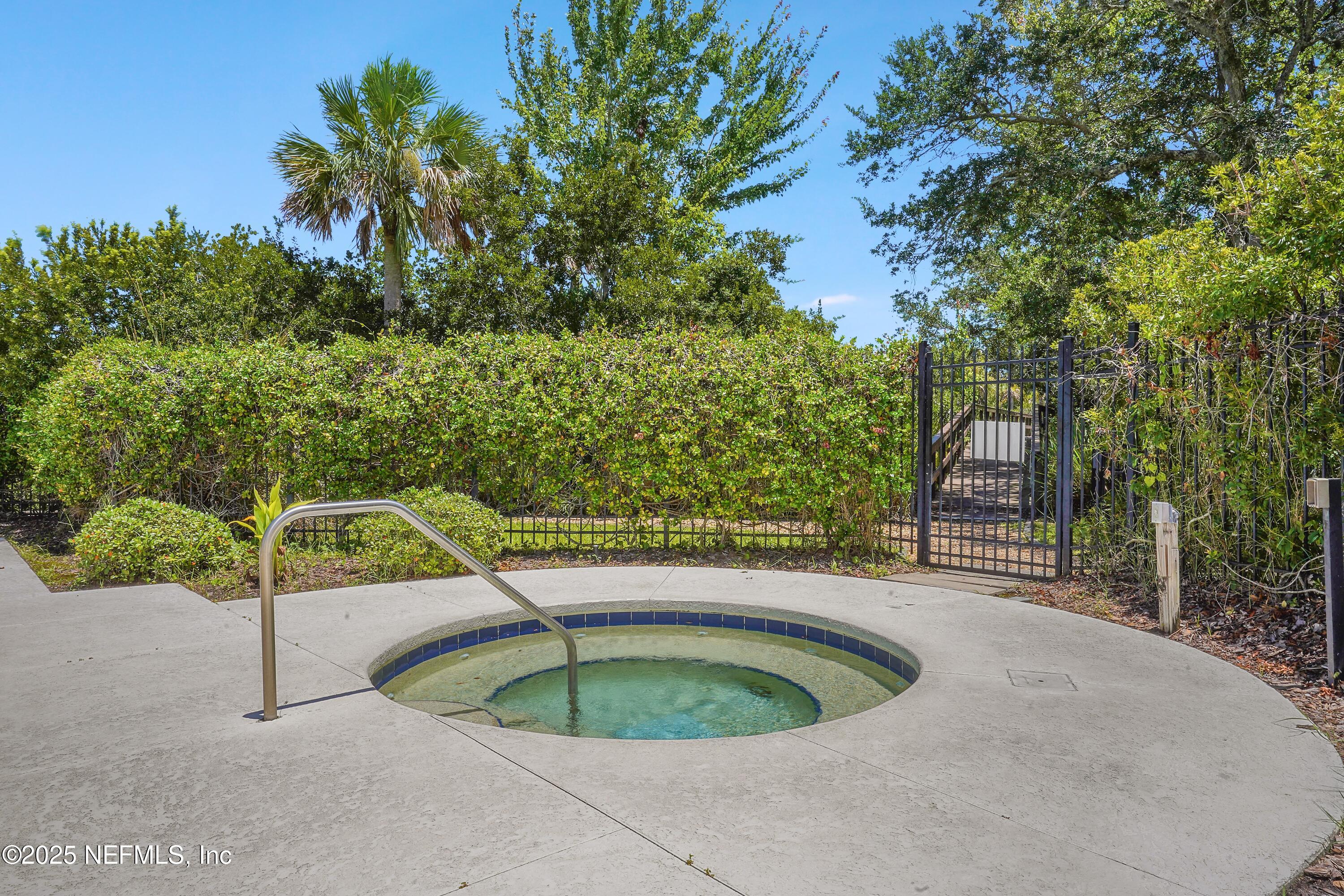 2827 Vista Cove Road St. Augustine, FL 32084 - Photo 45 of 59 a small pool with trees in the background