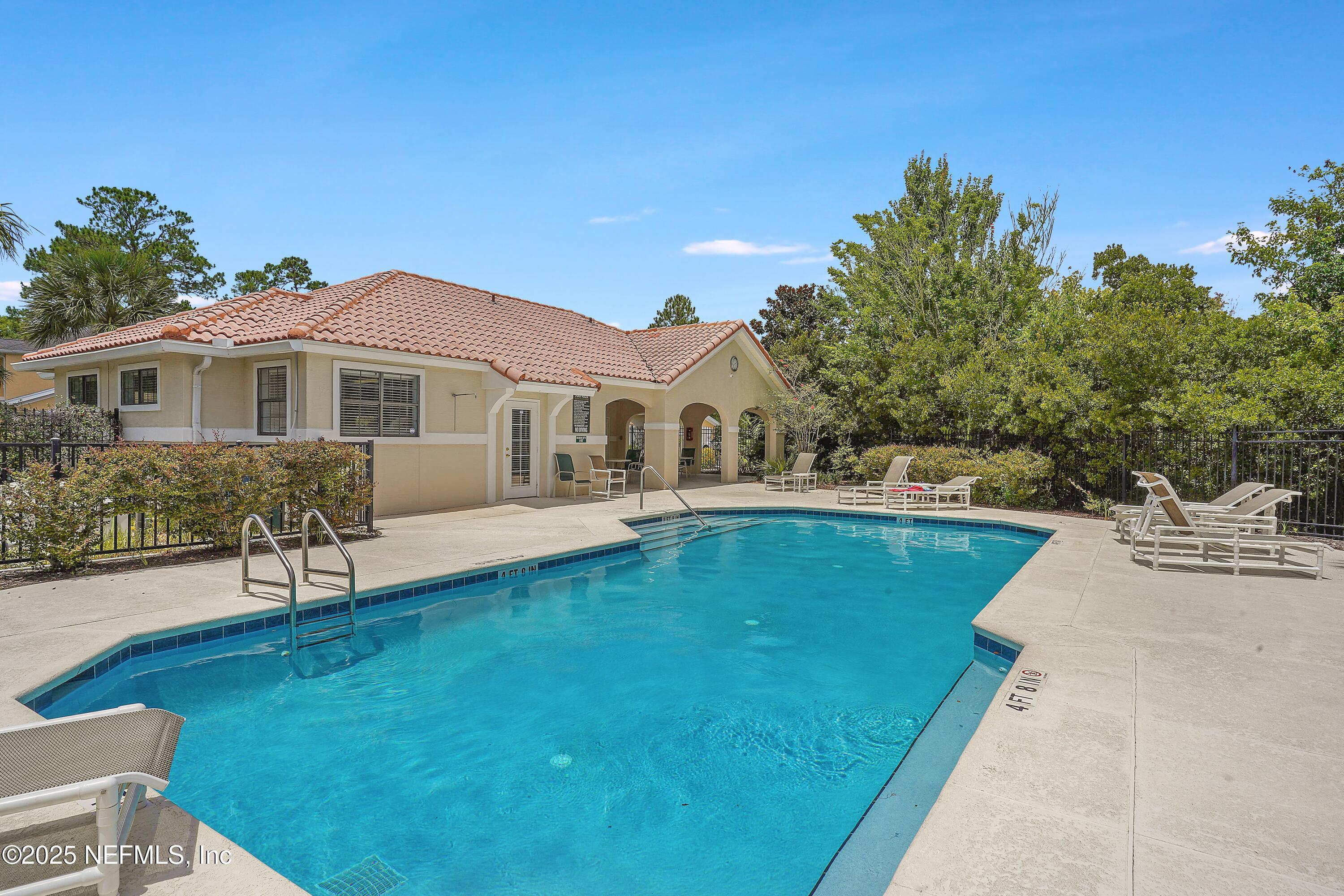 2827 Vista Cove Road St. Augustine, FL 32084 - Photo 47 of 59 a view of a house with a swimming pool