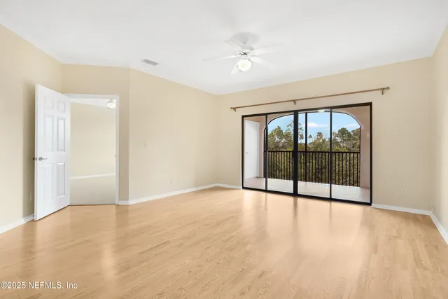 a view of a livingroom with wooden floor