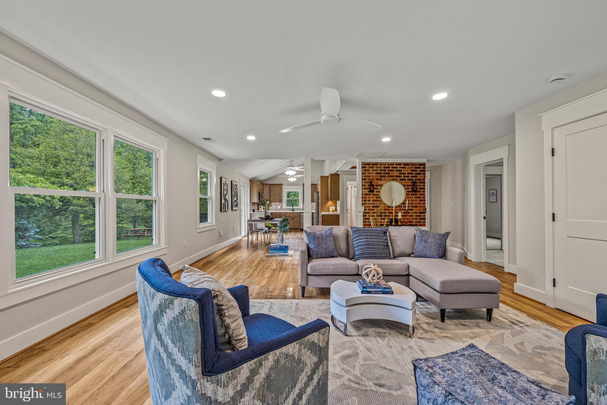 5861 Vine Lane Linden, VA 22642 - Photo 1 of 54 a living room with furniture and a large window