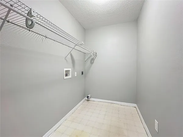 a view of a room with racks on the wall