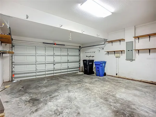 a view of empty room with windows
