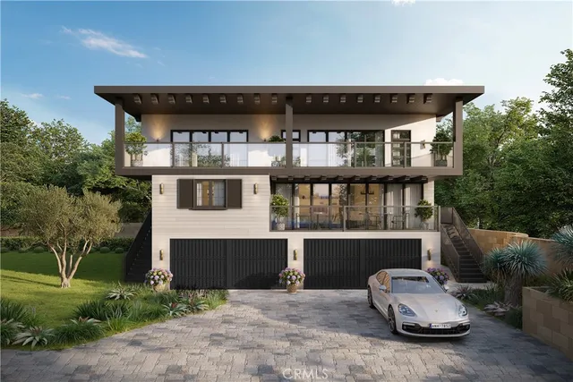 a front view of a house with a yard and balcony