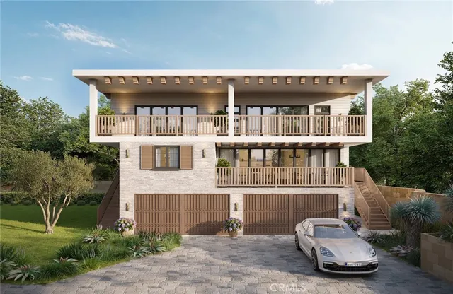 a front view of a house with a garden and plants