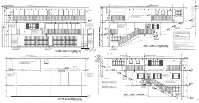 a black and white photo of a living room