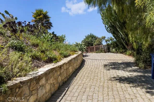 a view of balcony with yard