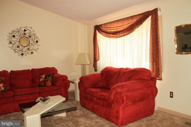 62 Yew Road Baltimore, MD 21221 - Photo 14 of 30 a living room with furniture and a window
