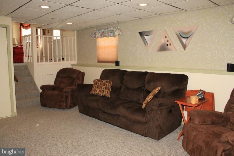 62 Yew Road Baltimore, MD 21221 - Photo 5 of 30 a living room with furniture and a large window