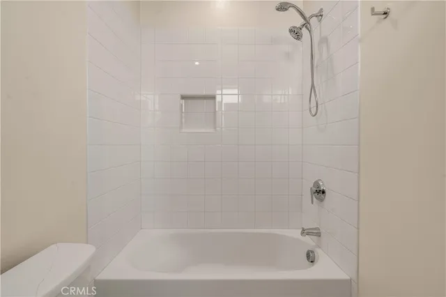 a close up of a bathtub curtain