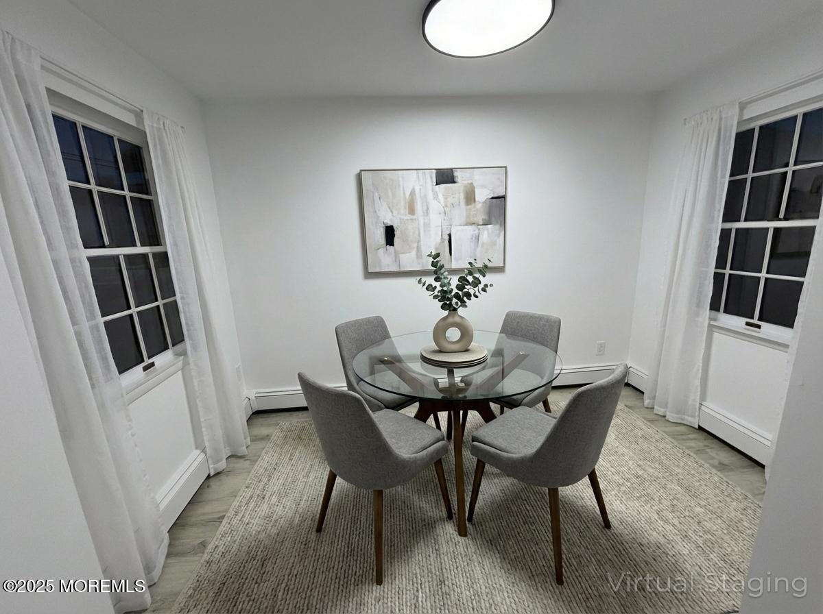 14 3rd Street Keyport, NJ 07735 - Photo 15 of 27 a view of a dining room that has a table and chairs