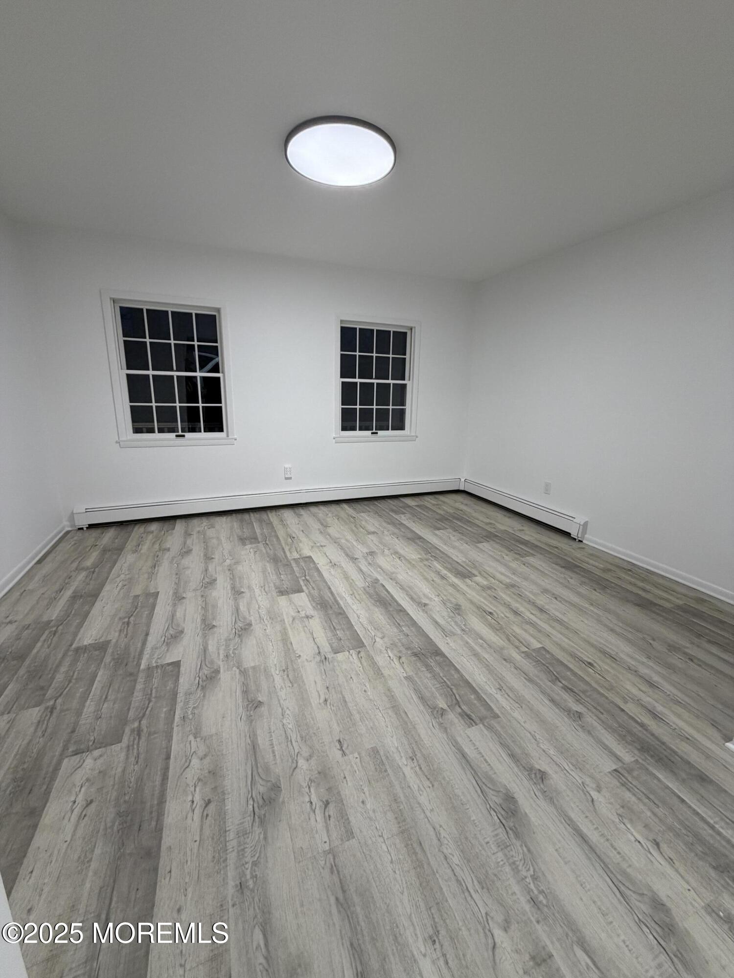 14 3rd Street Keyport, NJ 07735 - Photo 18 of 27 wooden floor in a room
