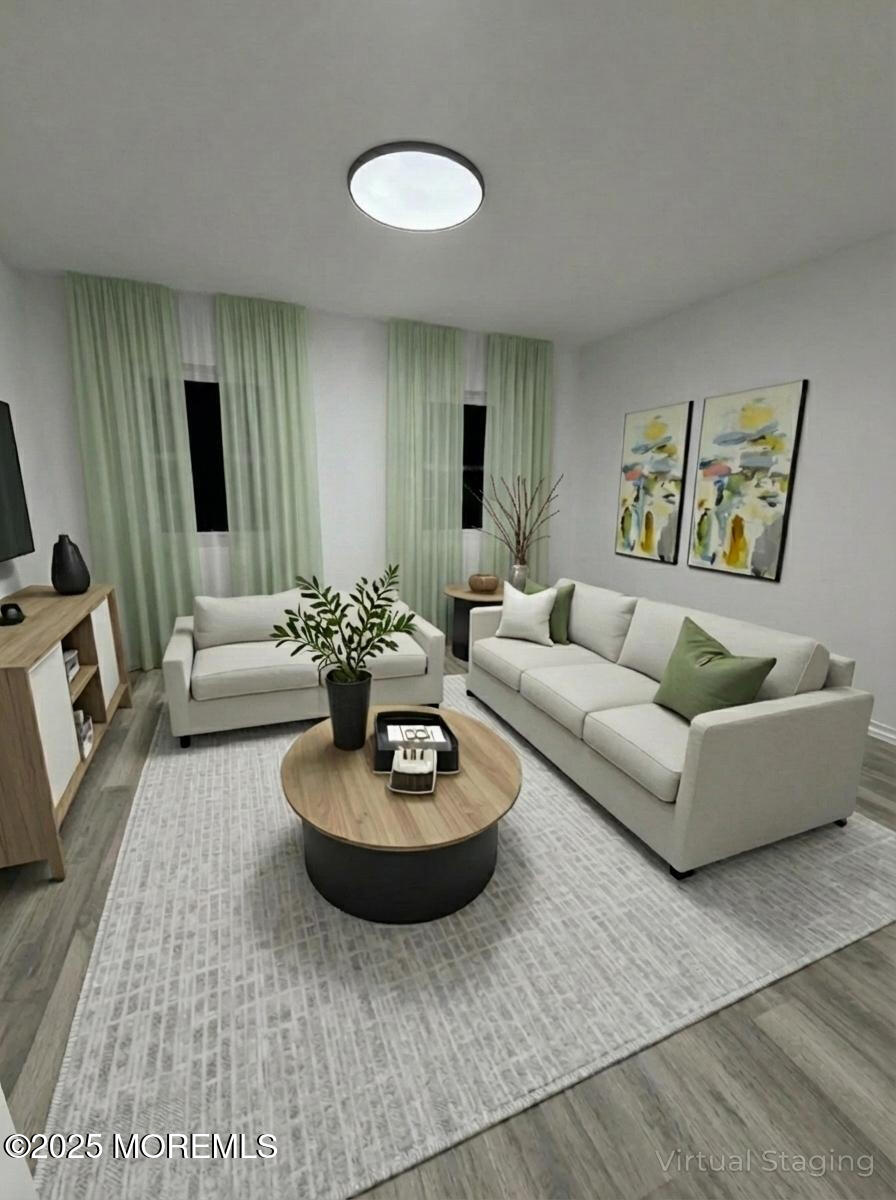 14 3rd Street Keyport, NJ 07735 - Photo 19 of 27 a living room with furniture and wooden floor