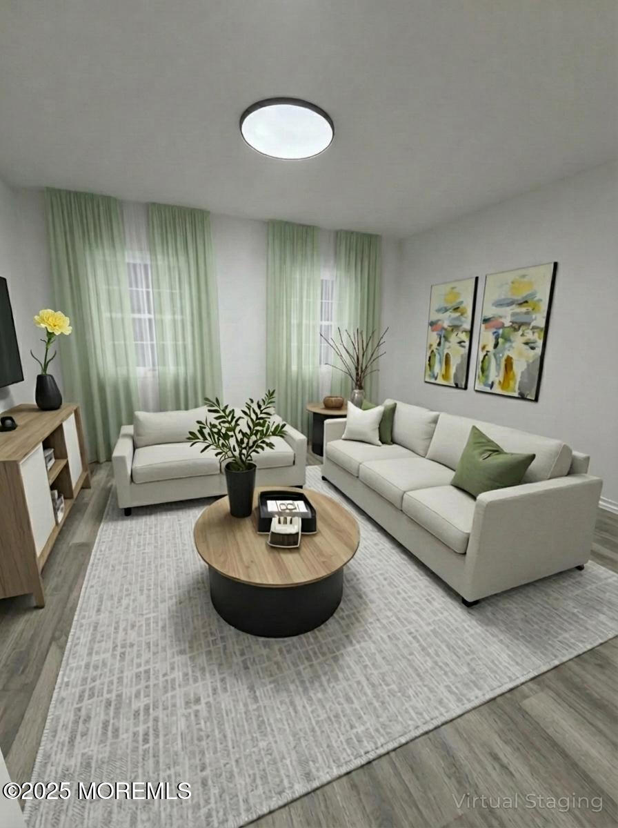 14 3rd Street Keyport, NJ 07735 - Photo 20 of 27 a living room with furniture and a rug