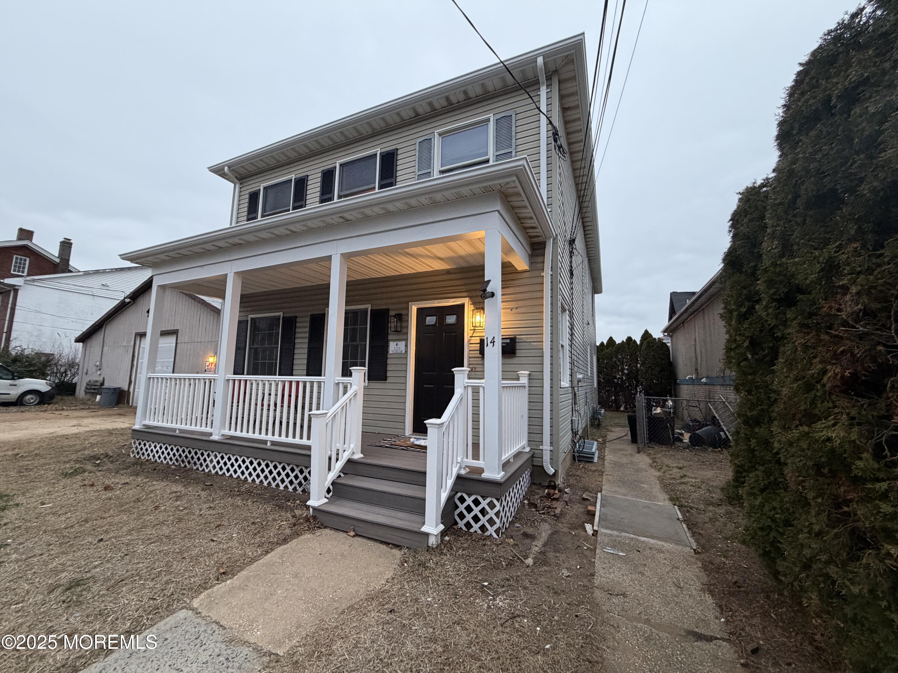 14 3rd Street Keyport, NJ 07735 - Photo 2 of 27 a view of a house with a yard and large tree