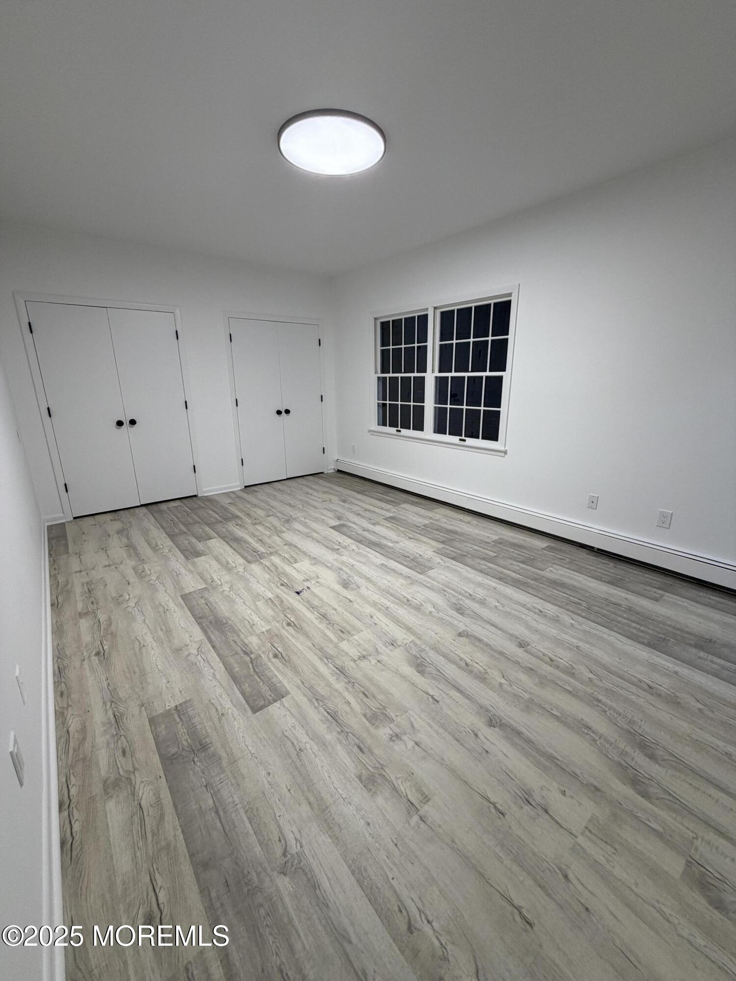 14 3rd Street Keyport, NJ 07735 - Photo 21 of 27 a view of an empty room with a window