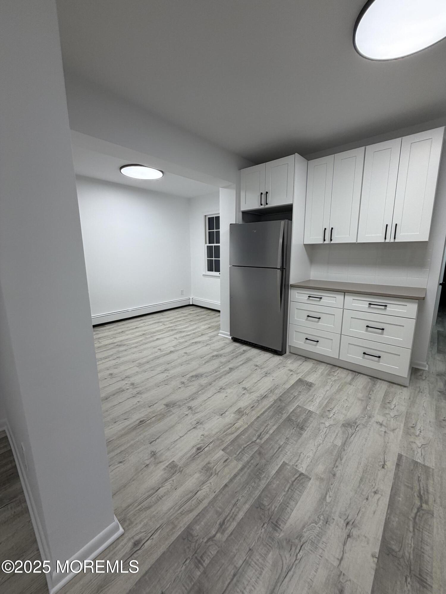 14 3rd Street Keyport, NJ 07735 - Photo 6 of 27 a view of a kitchen with a sink