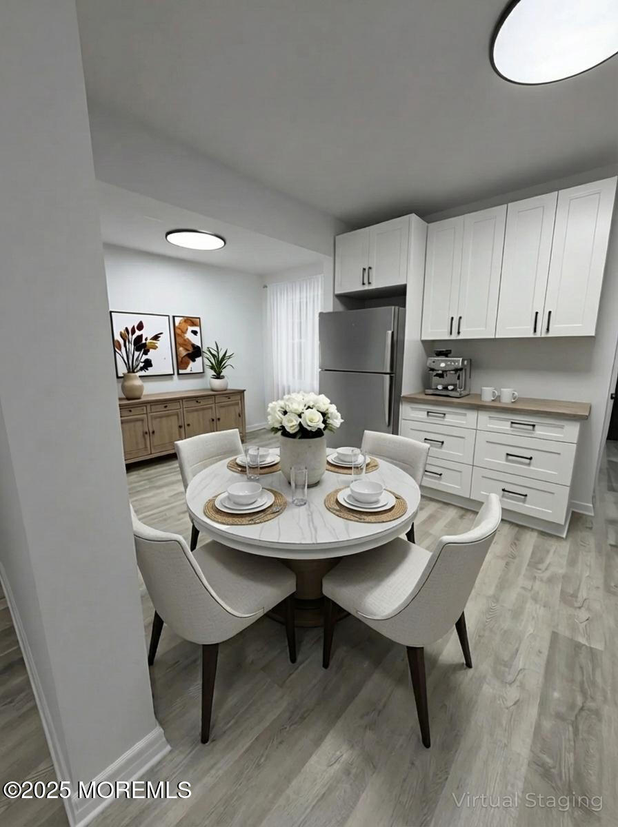 14 3rd Street Keyport, NJ 07735 - Photo 7 of 27 a kitchen with a sink cabinets and wooden floor
