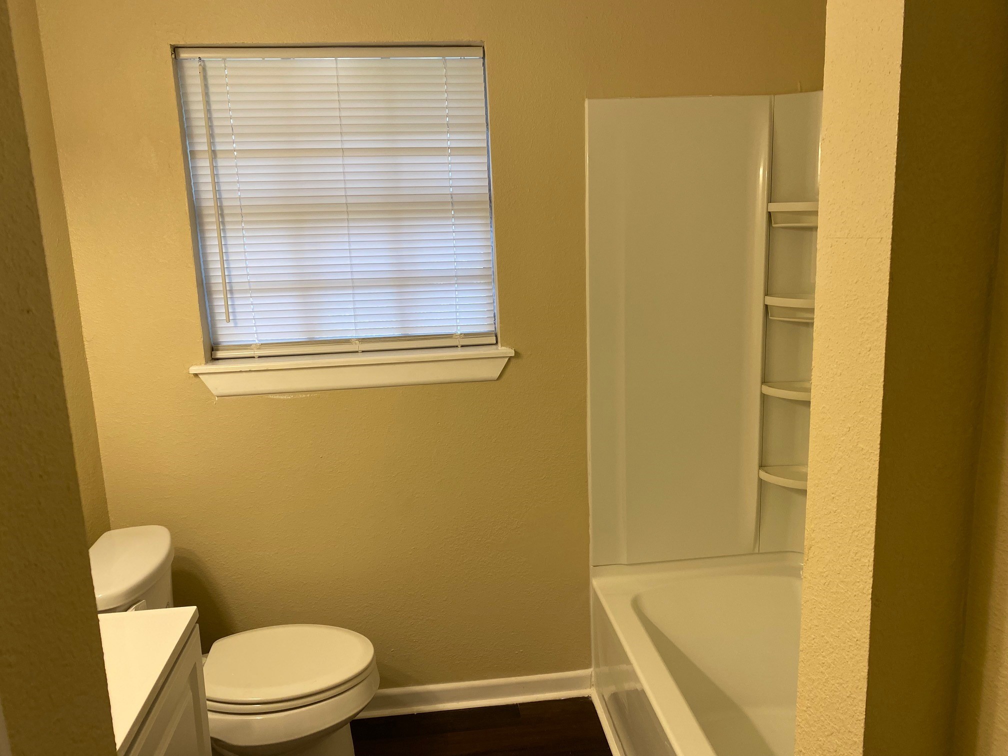 112 County Road 921 Angleton, TX 77515 - Photo 10 of 13 a bathroom with a toilet and a shower