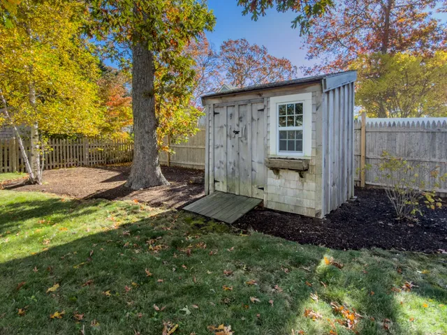 a view of a back yard of the house