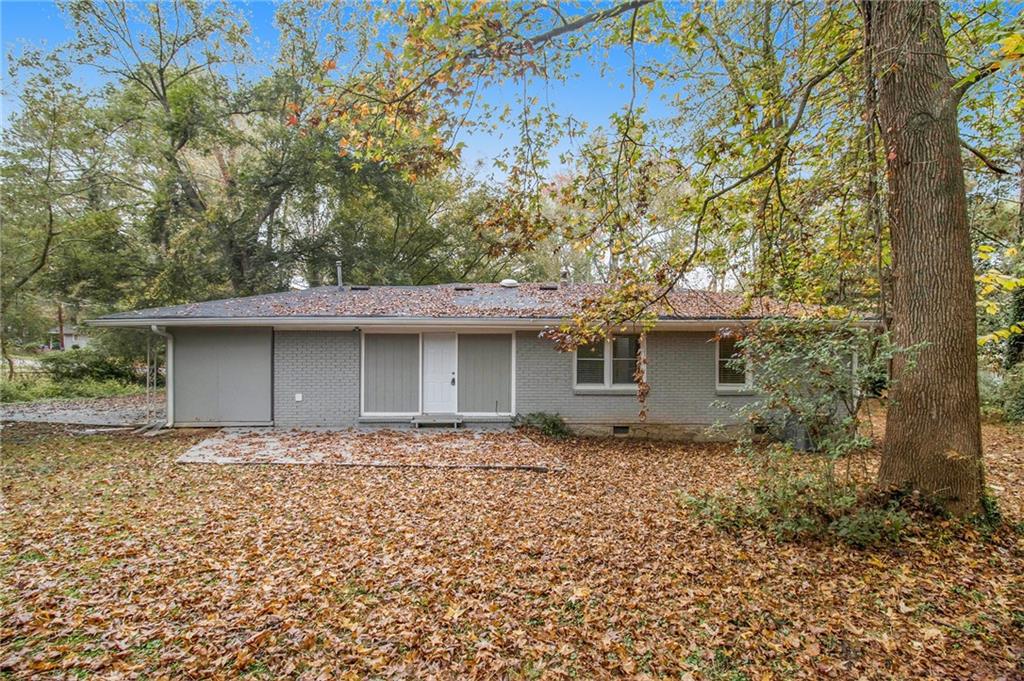 3449 Misty Valley Road Decatur, GA 30032 - Photo 23 of 25 a front view of a house with a garden