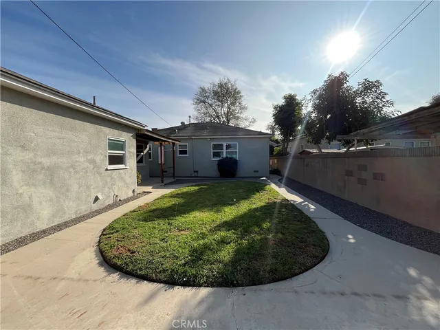 a view of a swimming pool with a outdoor seating