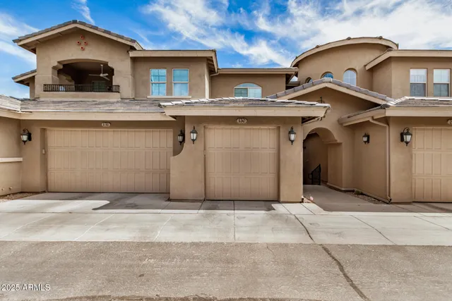 a view of a house with a garage